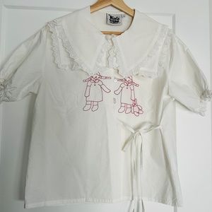 Kina+Tam white blouse with cute embroidery details